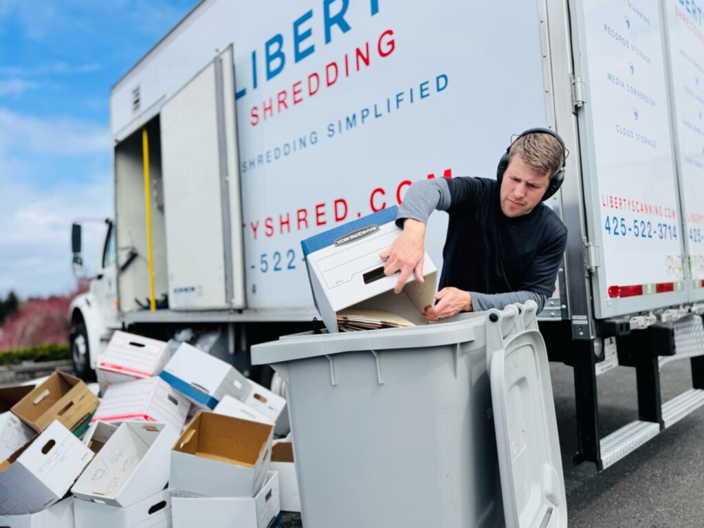 Man doing on-site shredding by Liberty Scanning shredding truck