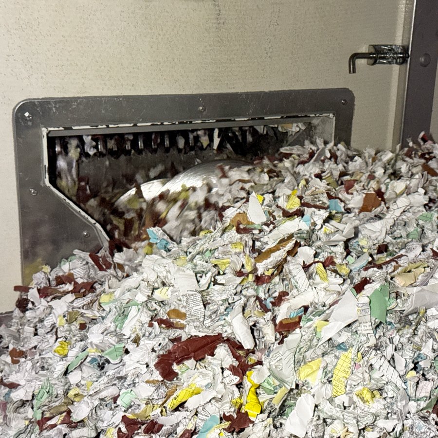 shredded paper in a shred truck