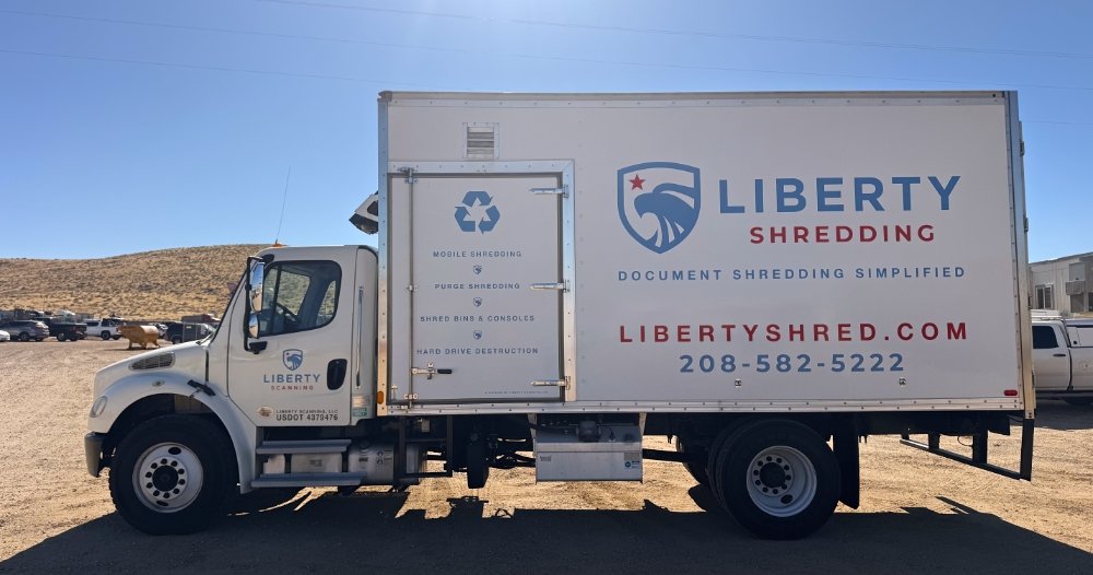 Side view of the Liberty Shredding mobile document destruction truck