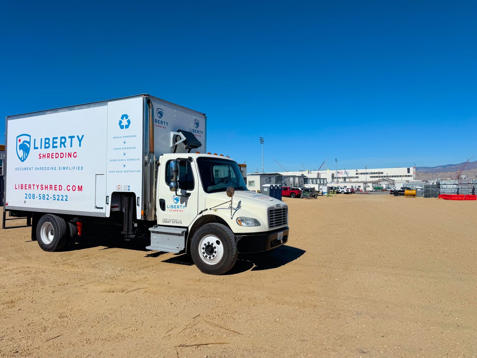Liberty Shredding truck at an outdoor service location